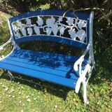 Wood garden bench and iron cast iron. Grape clusters