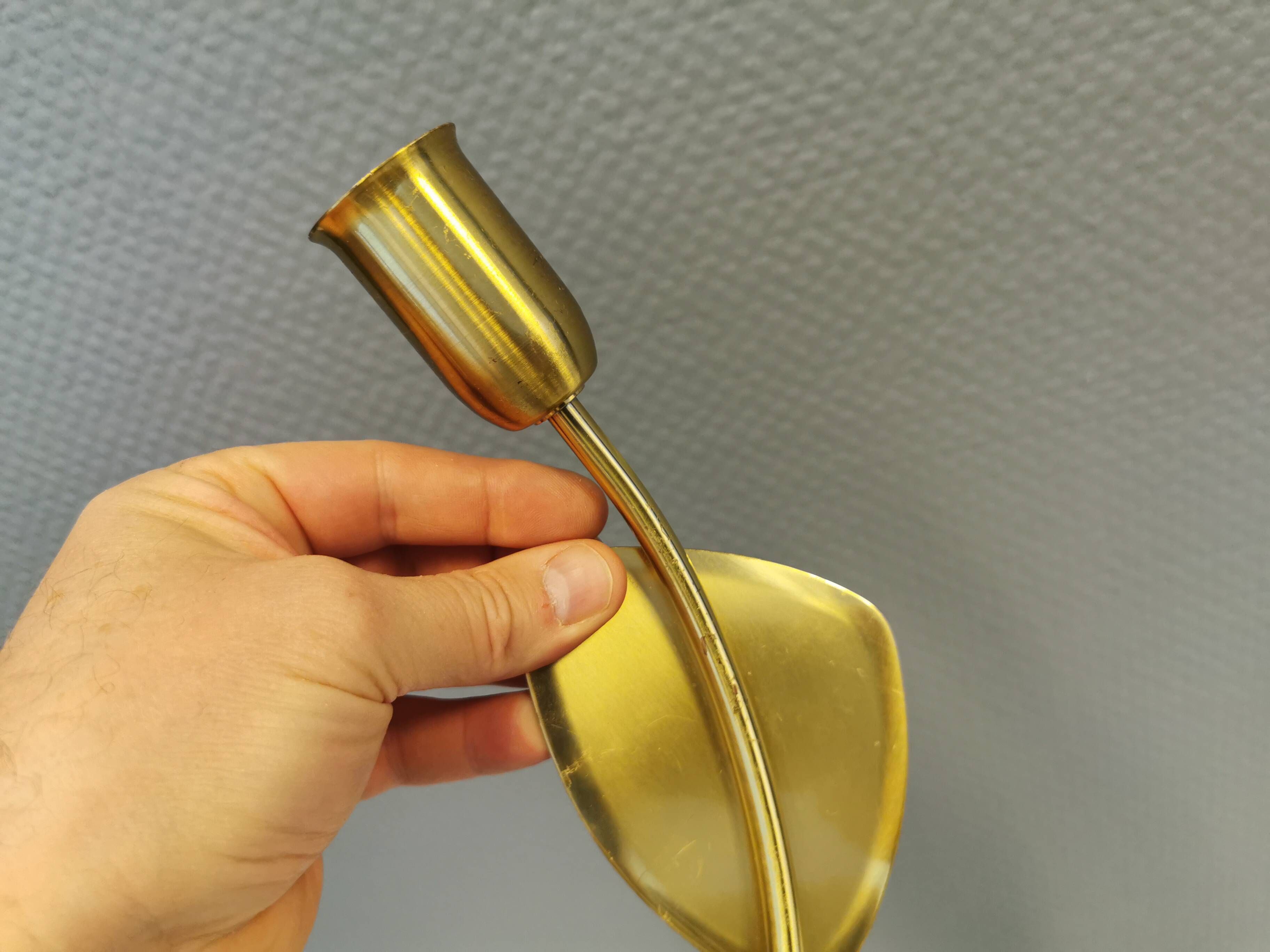 A set of "tulip" wall lamps in golden colored metal. Danish 1970-80s