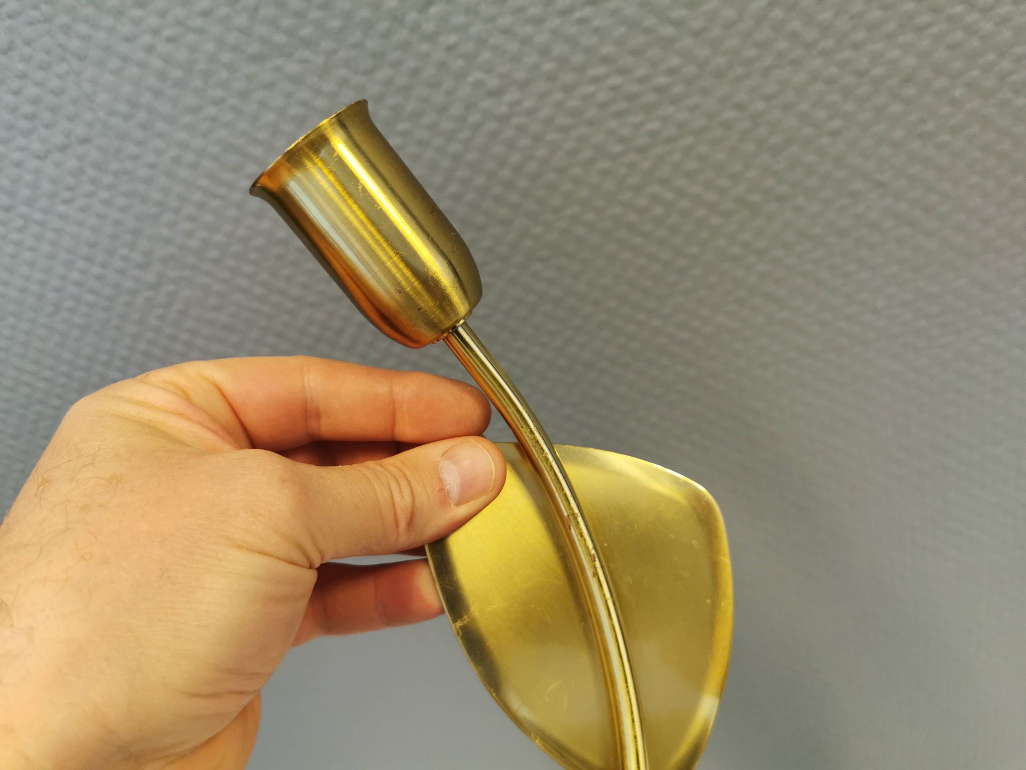 A set of "tulip" wall lamps in golden colored metal. Danish 1970-80s