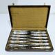 MARTIAL GAUTHIER / GEORGES FLAKENBERG - 12 KNIVES WITH SILVER HANDLES