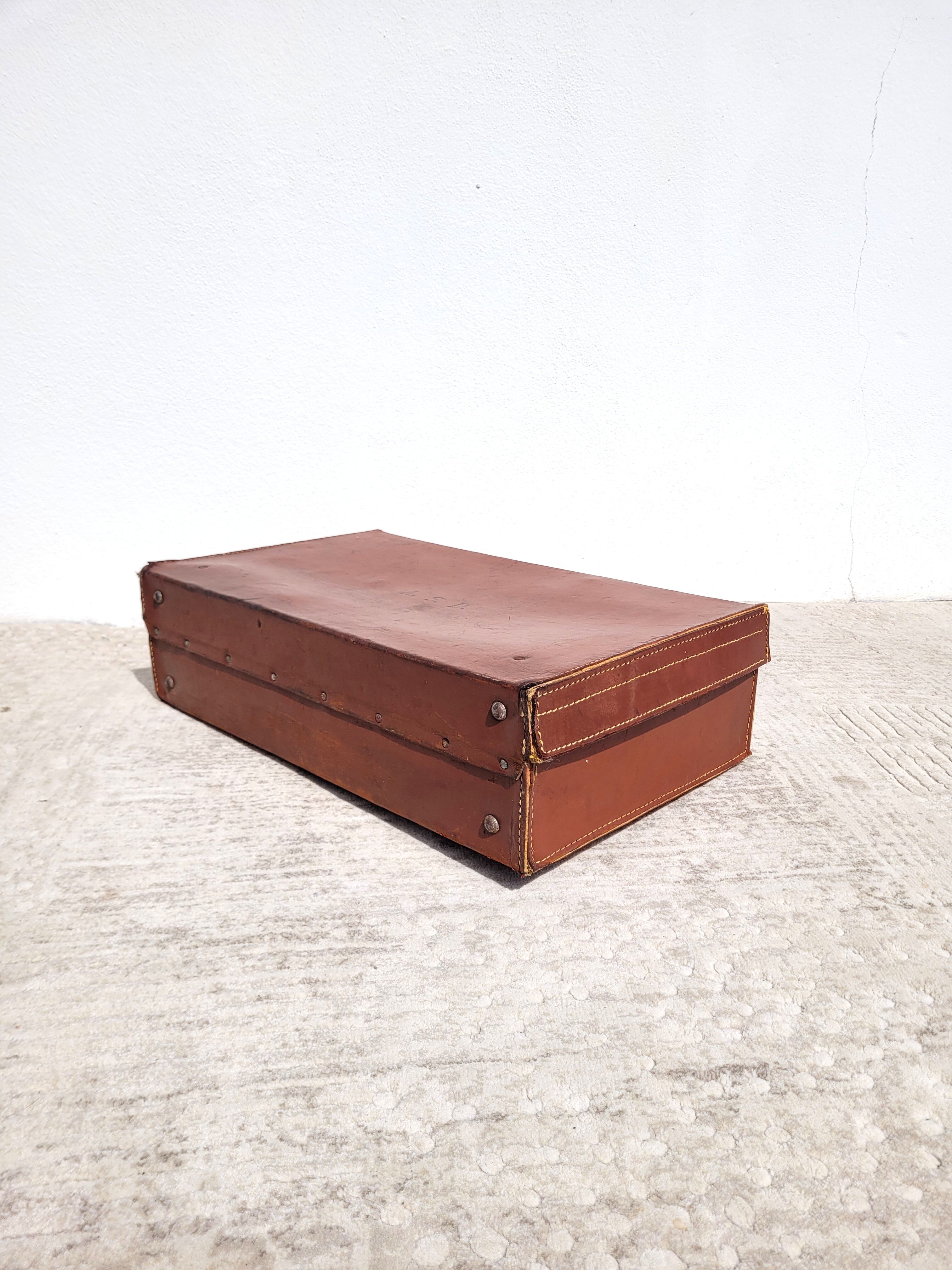 Old leather suitcase ASD