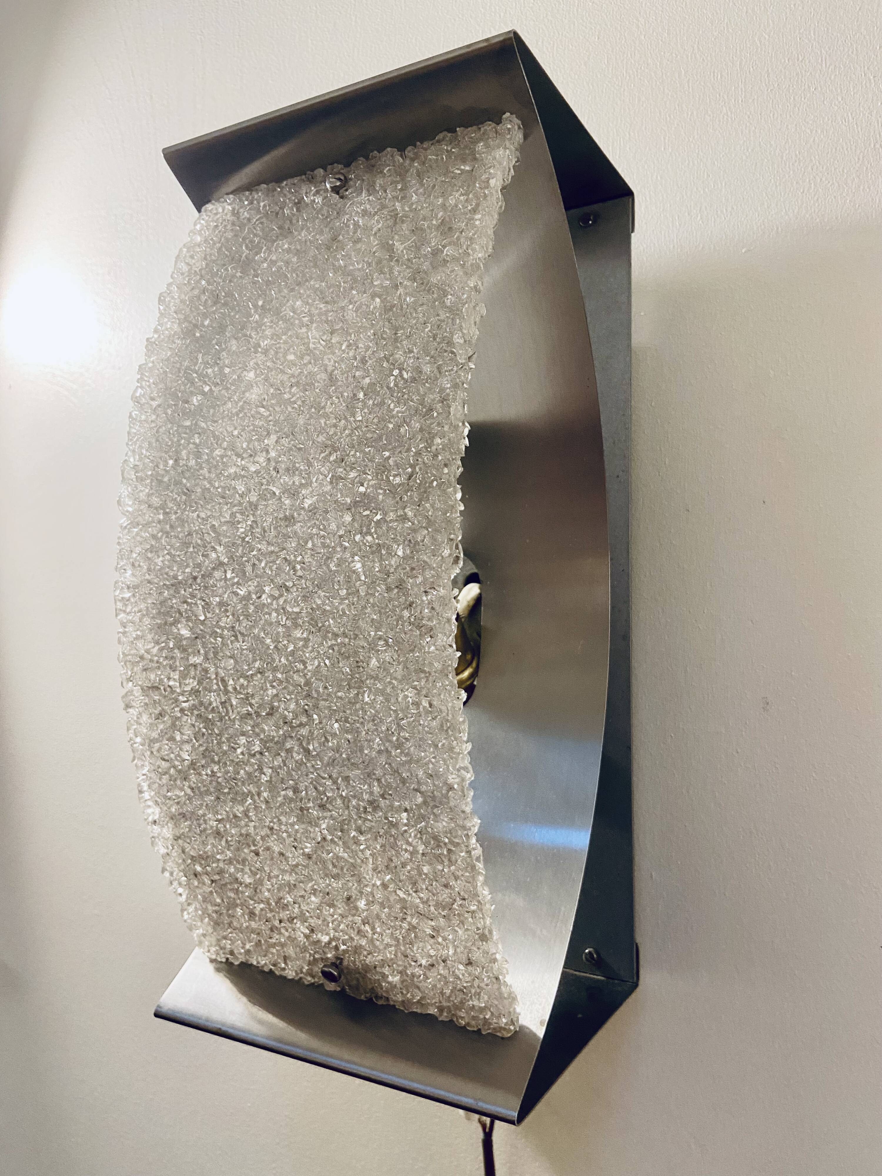 Pair of brushed steel and perspex wall lights, circa 1970.