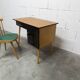 Baumann desk and its matching chair 1960 formica wood and black with green seat