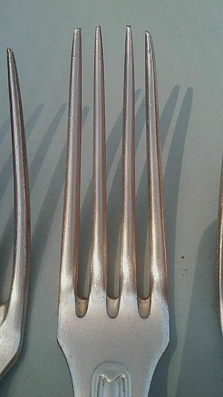 Set of six forks including three in white metal alloy SFAM a Christofle
