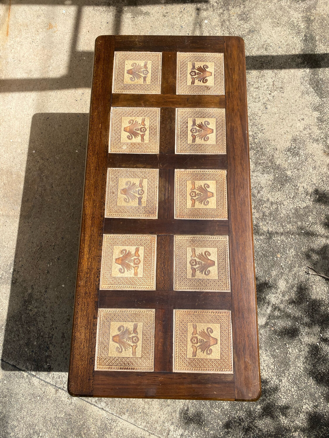Vintage 60s coffee table with tile decoration of birds and flowers.