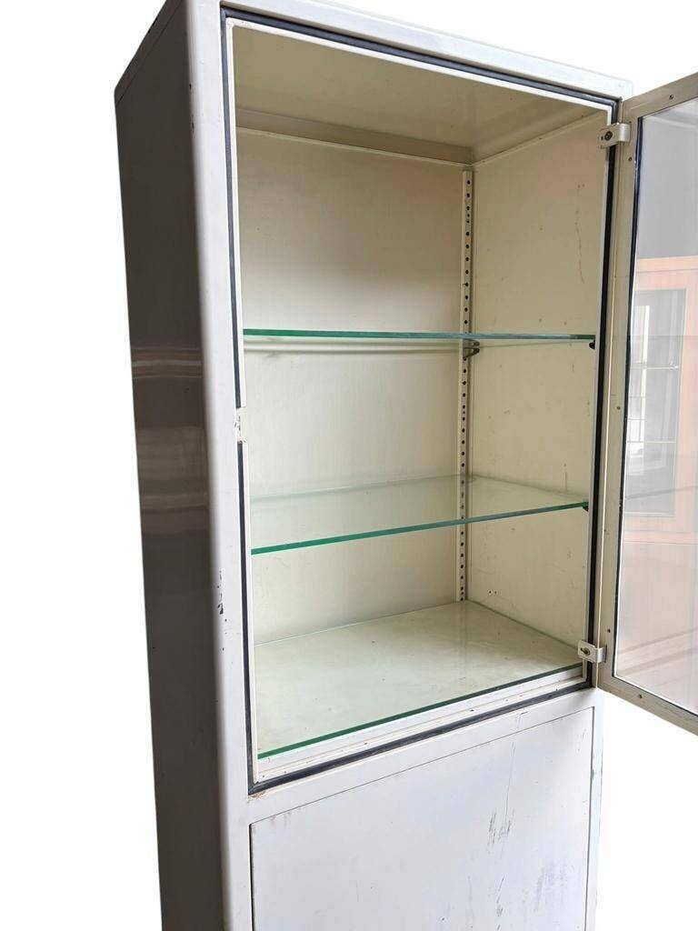 Vintage white industrial apothecary cabinet / display case