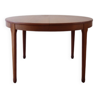 Tricoire and Vecchione extendable round table