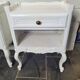 Pair of white patinated Louis XV style bedside tables