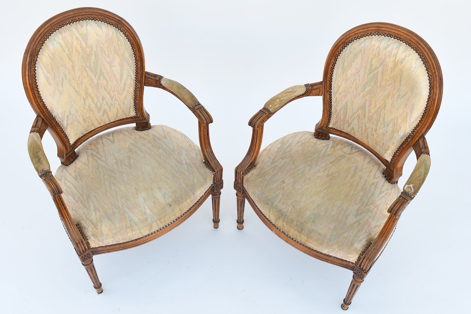 Pair of Louis XVI-style convertible armchairs