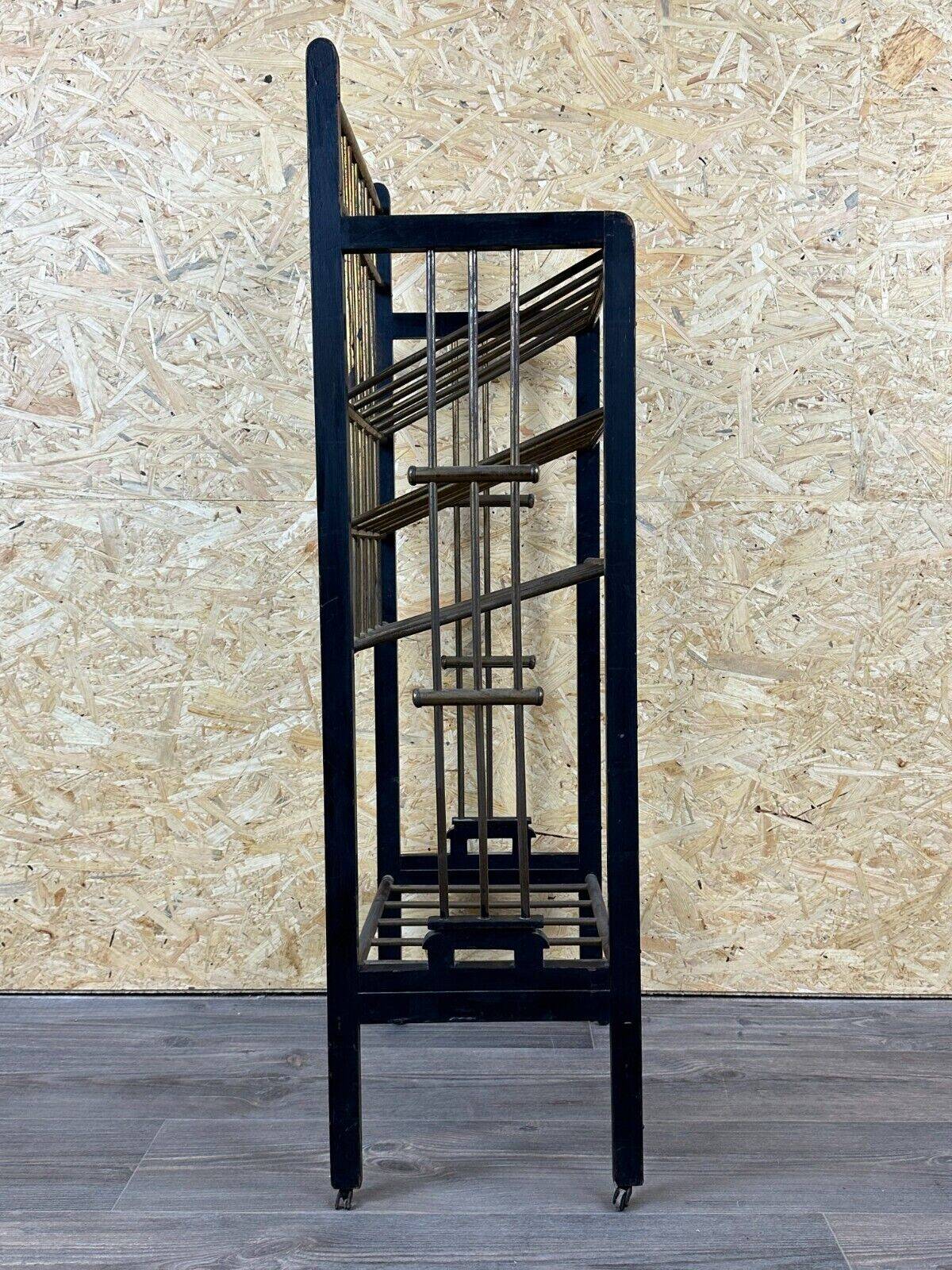 Magazine rack from Wiener Werkstätte Austria made of mahogany & brass around 1900