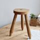 Vintage tripod stool in light raw wood