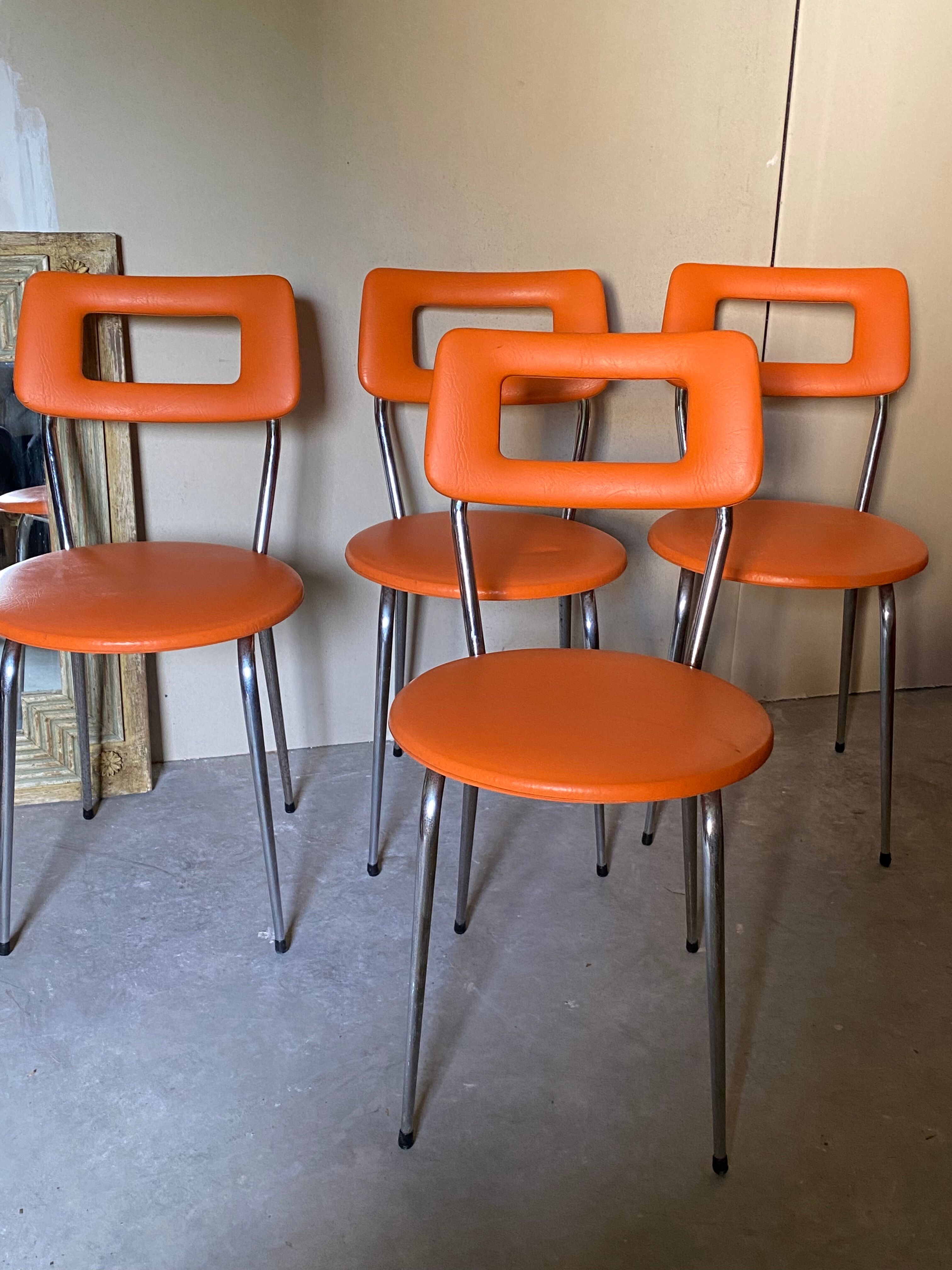 Set of 4 chairs 70s in skaï