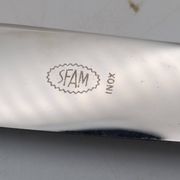 Set of 12 sfam knives in silver metal and stainless steel blades.