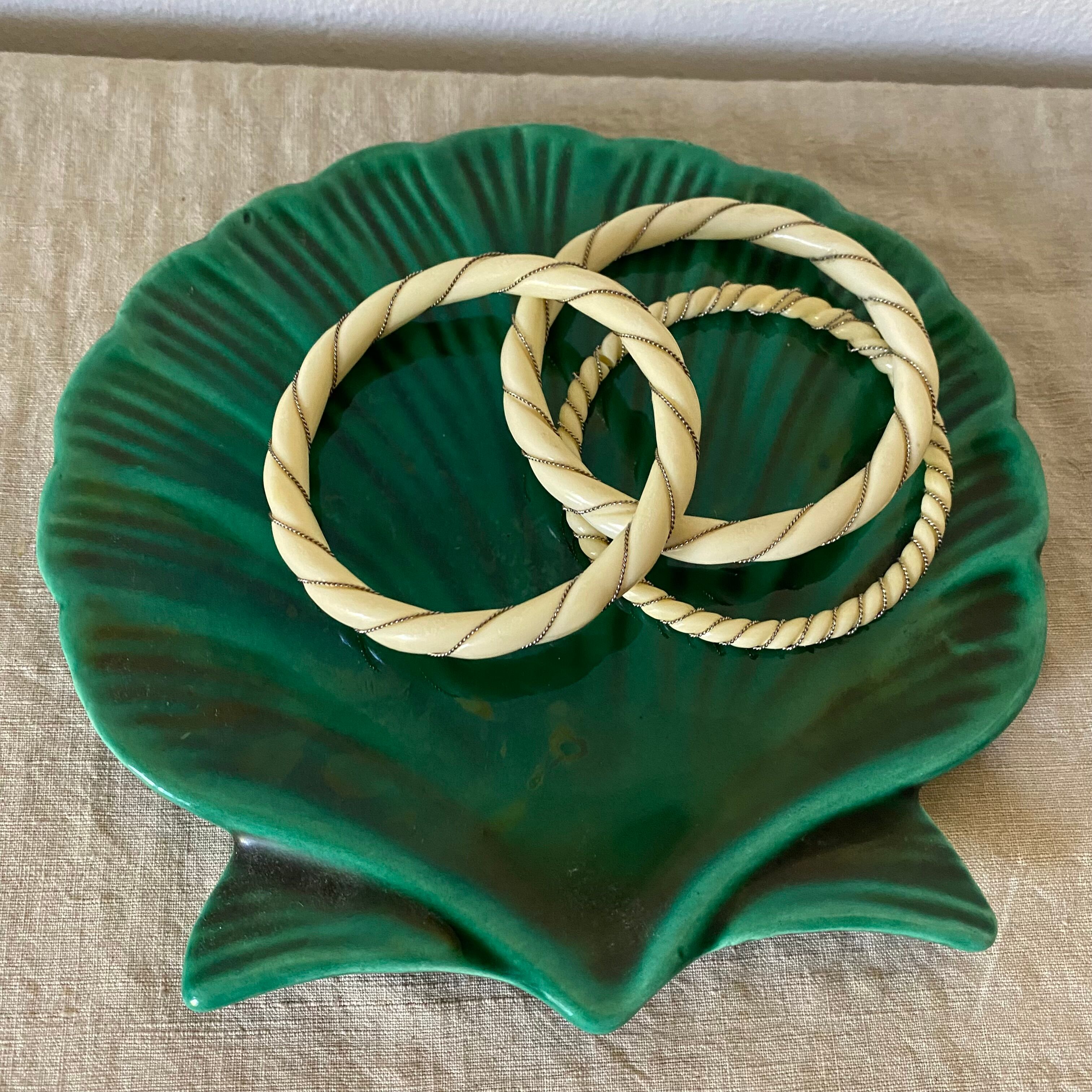 Empty ceramic pocket scallop shell