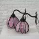 Pair of Tiffany style iron and glass leg wall lights