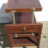 A rolling table with a removable tray