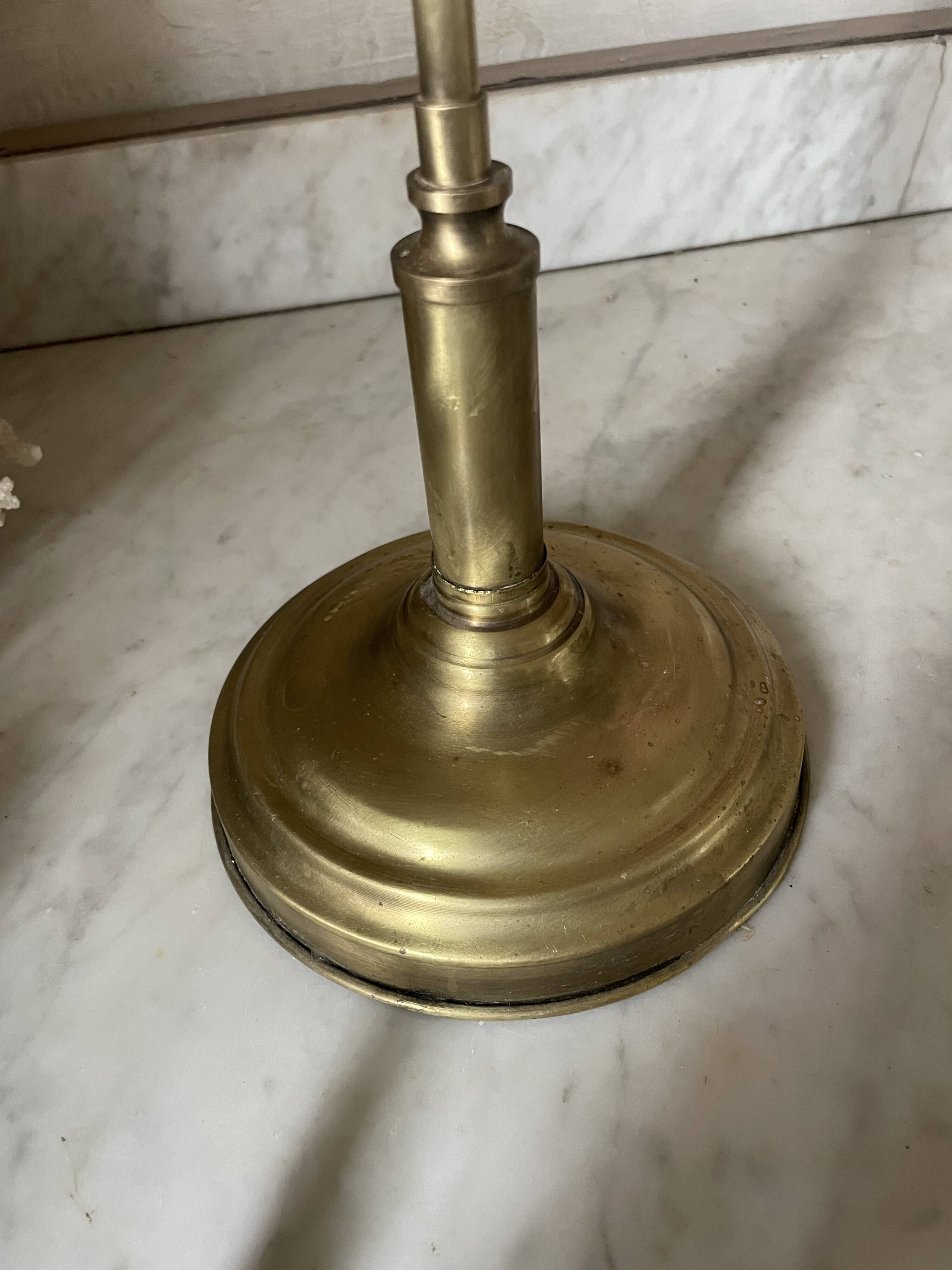 Large vintage lamp in brass with a pink opaline shade.