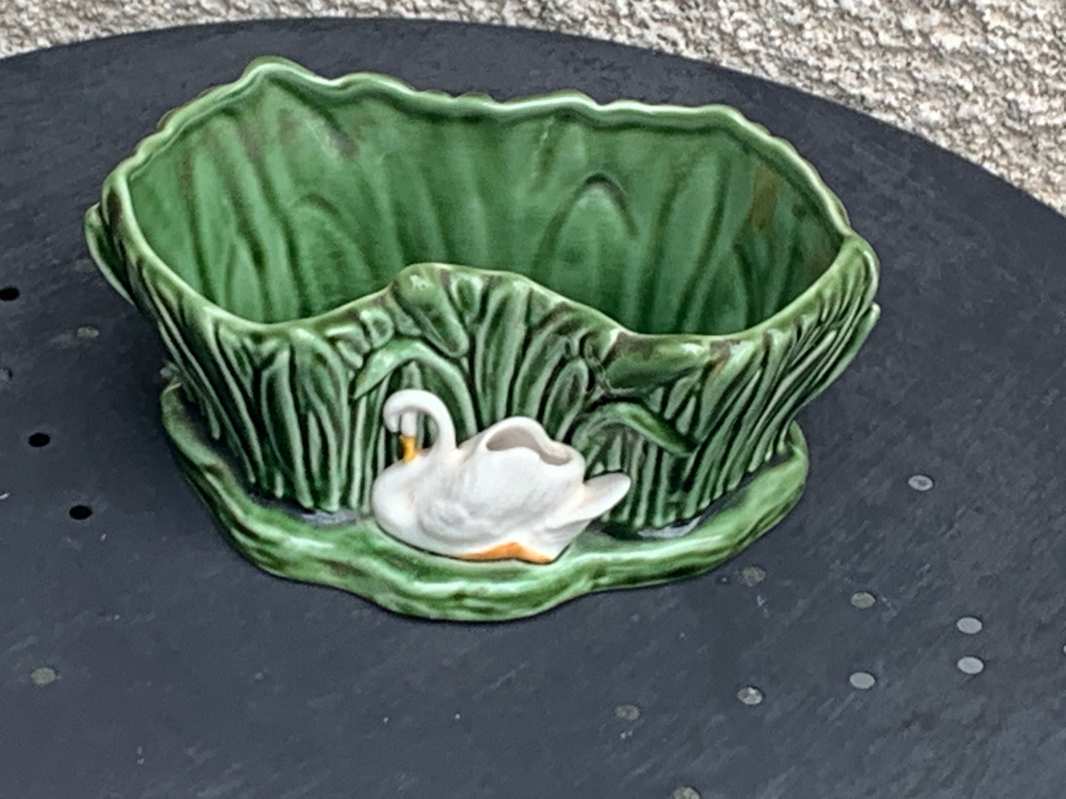 Pot cover in ceramic slurry glazed green pattern foliage and swan made in england numbered