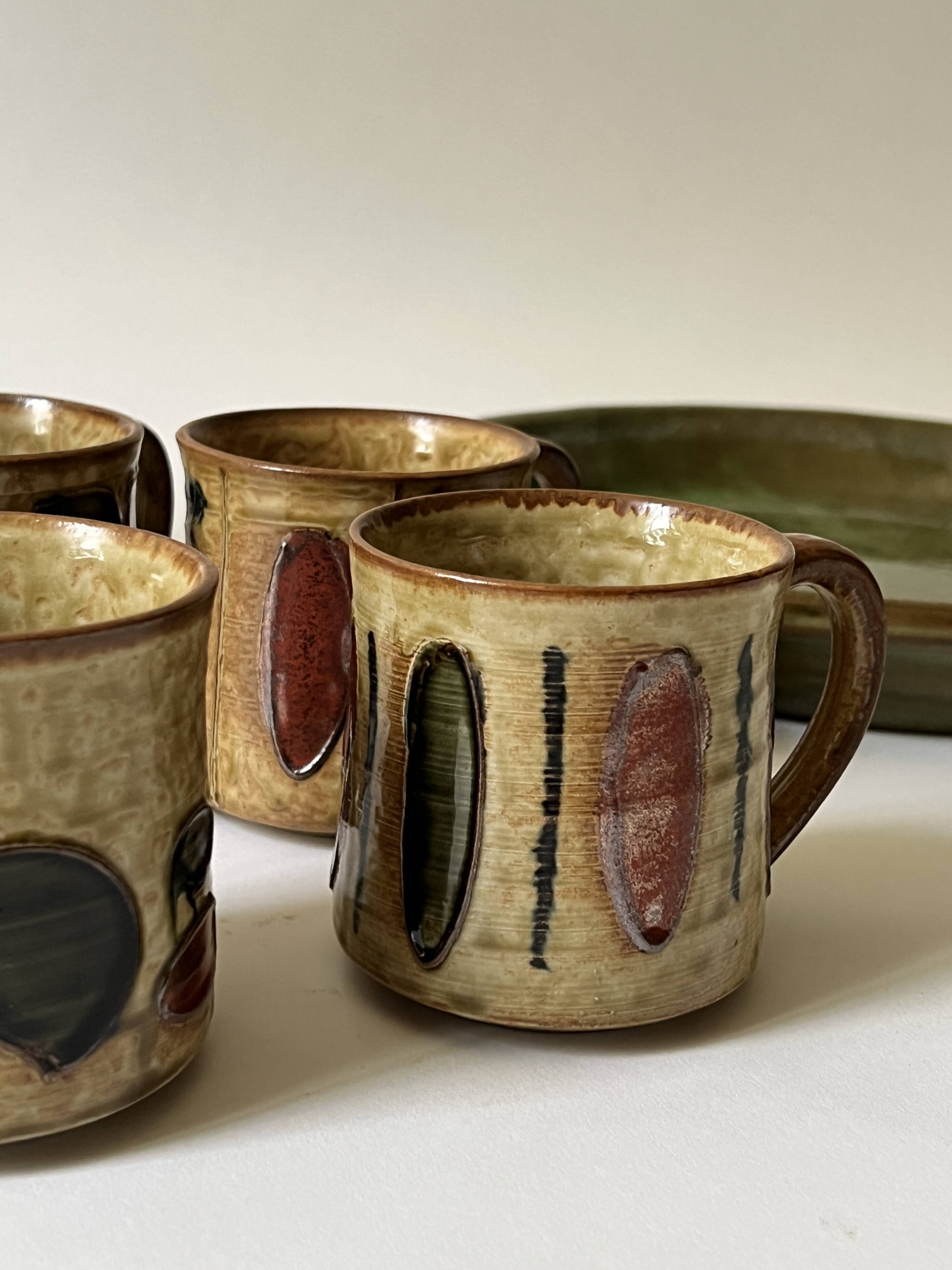 Set of 4 glazed ceramic coffee cups, circa 1970