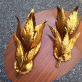 Pair of gold leaf sconces