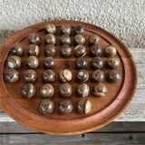 Solitaire game or mineral abacus