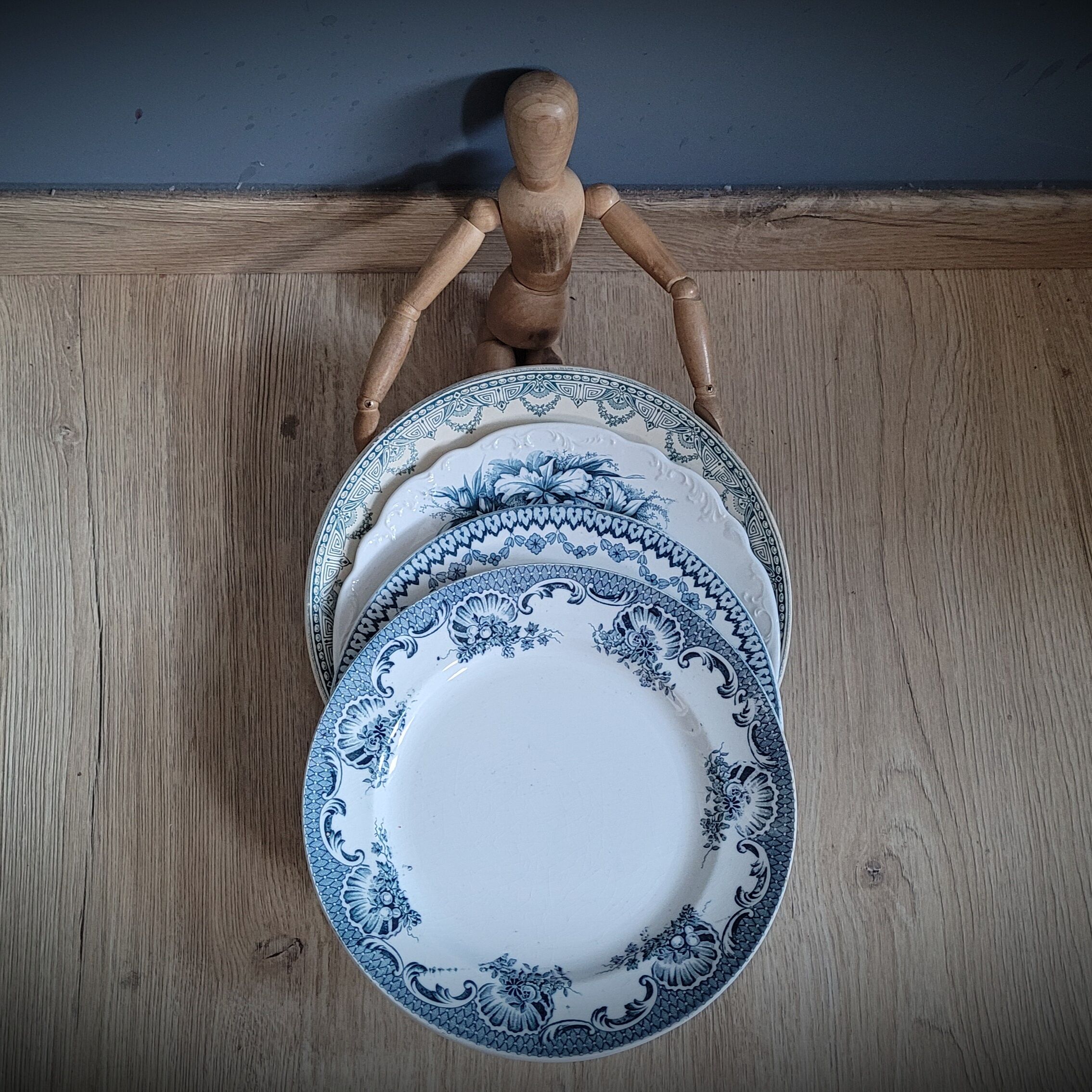 Quartet of mismatched blue plates