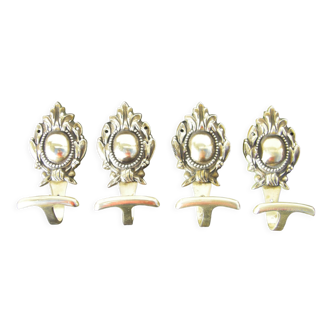 Series of four antique hooks