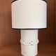 Table lamp in ceramic with a handmade couture-style lampshade from France.