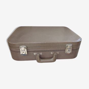 Vintage suitcase in skai