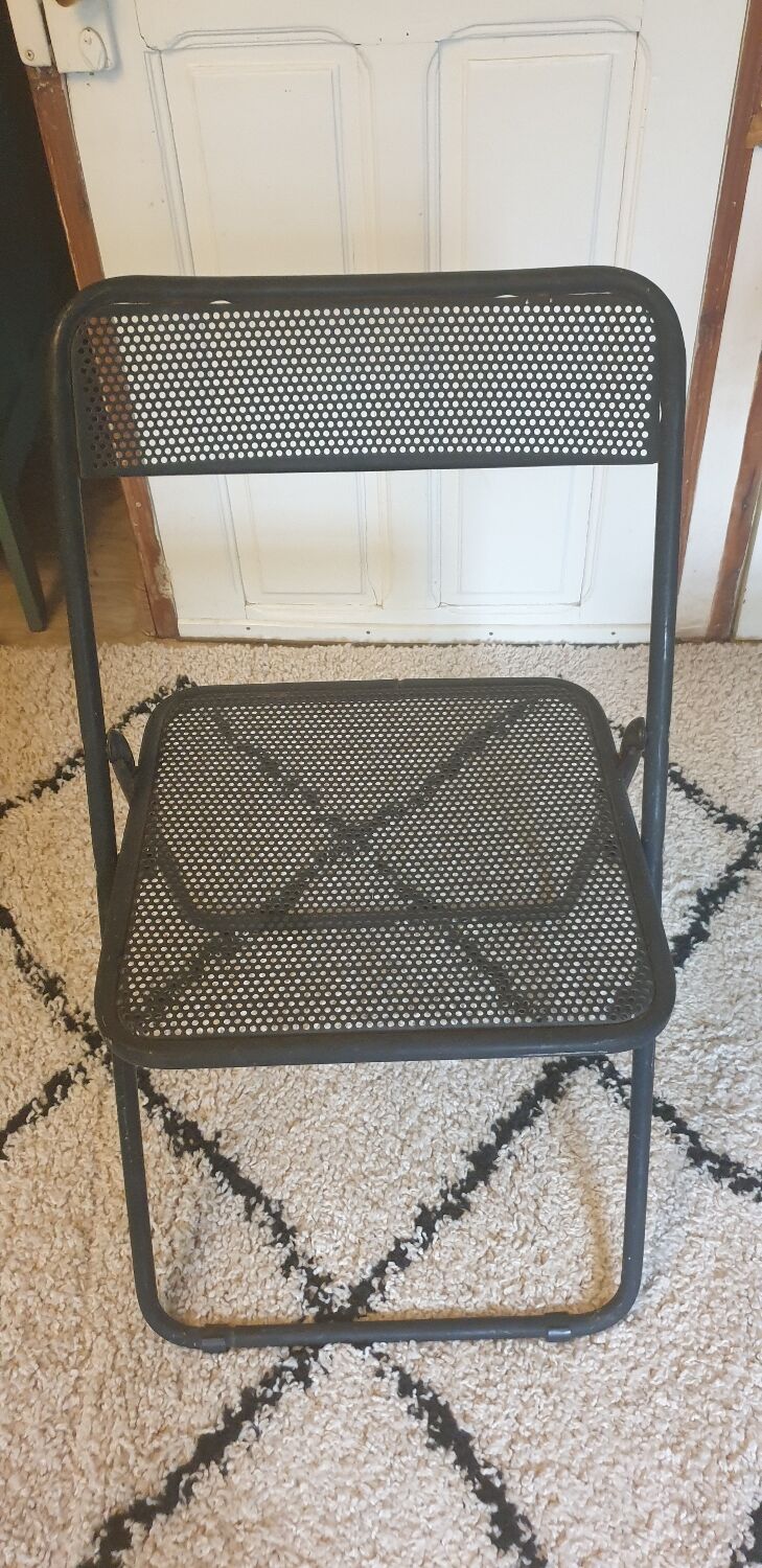 Pair of folding chairs in perforated metal