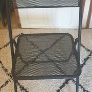 Pair of folding chairs in perforated metal