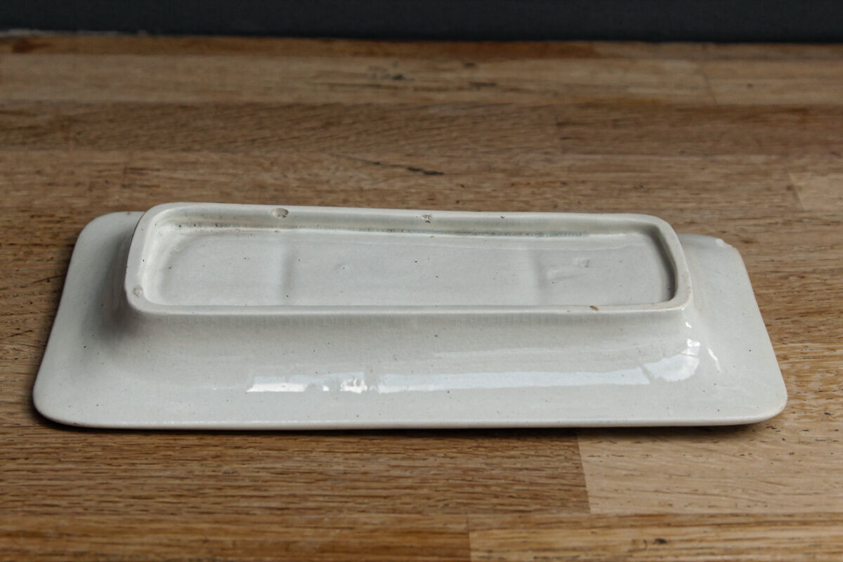 Earthenware soap holder