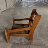 Armchairs in leather and vintage wood 70's