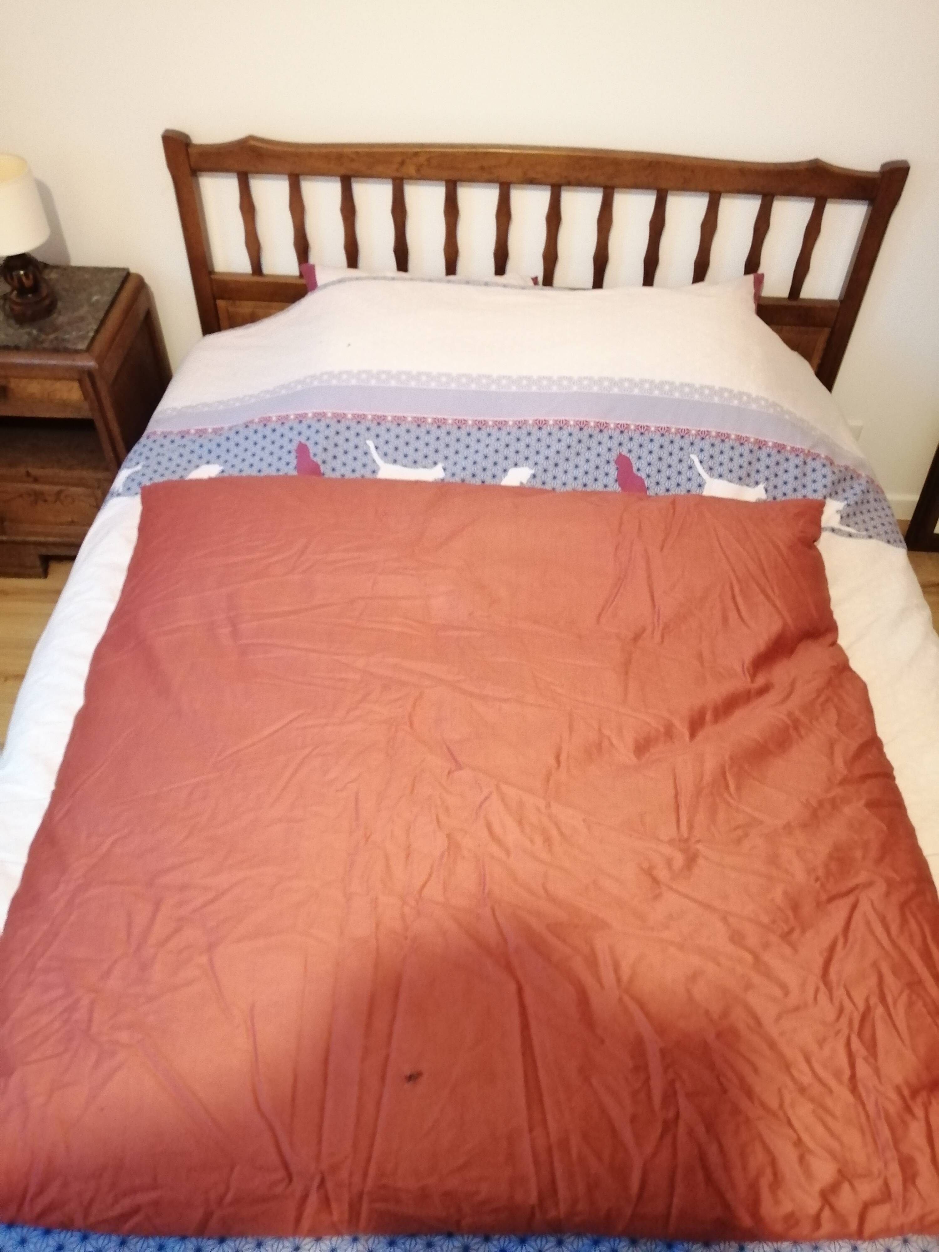 Old brick red quilt