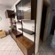 Unité murale danoise 1960 en teck par Poul Cadovius