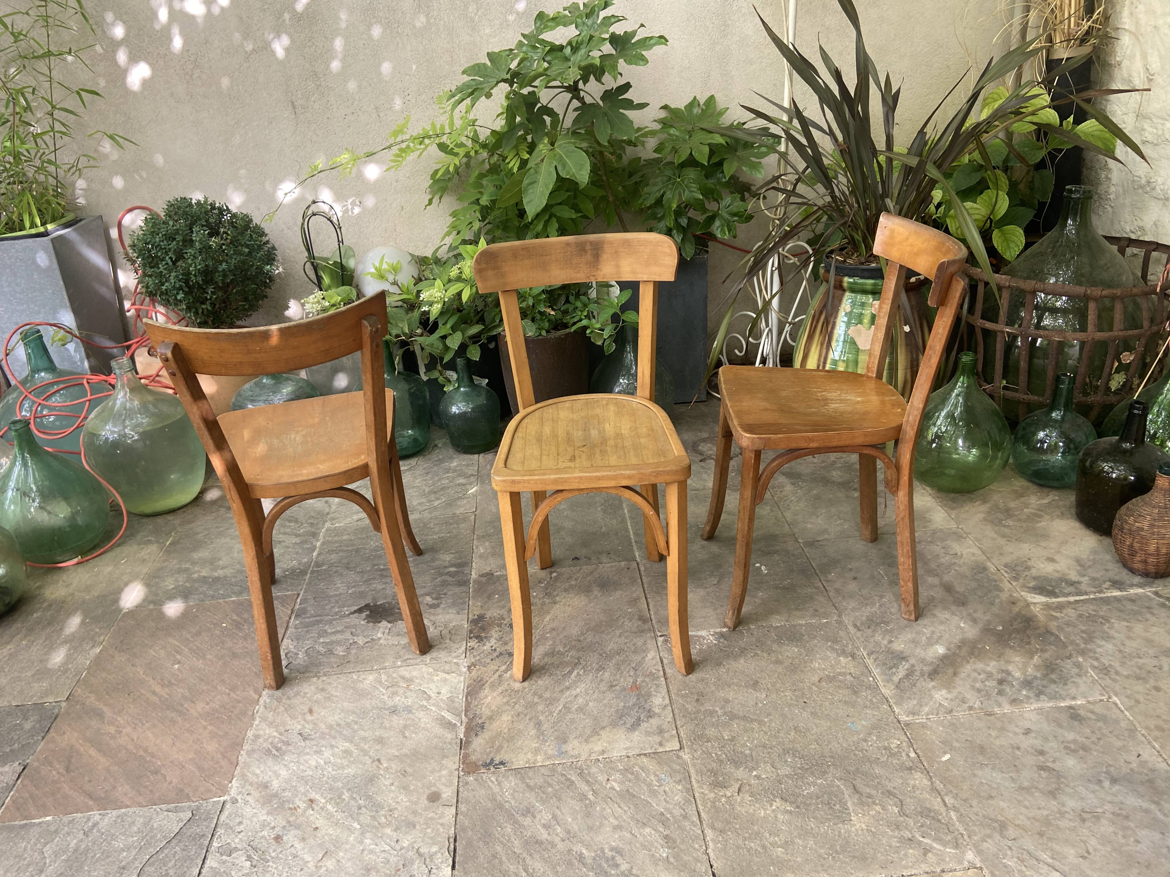 Trio of vintage Bauman bistro chairs
