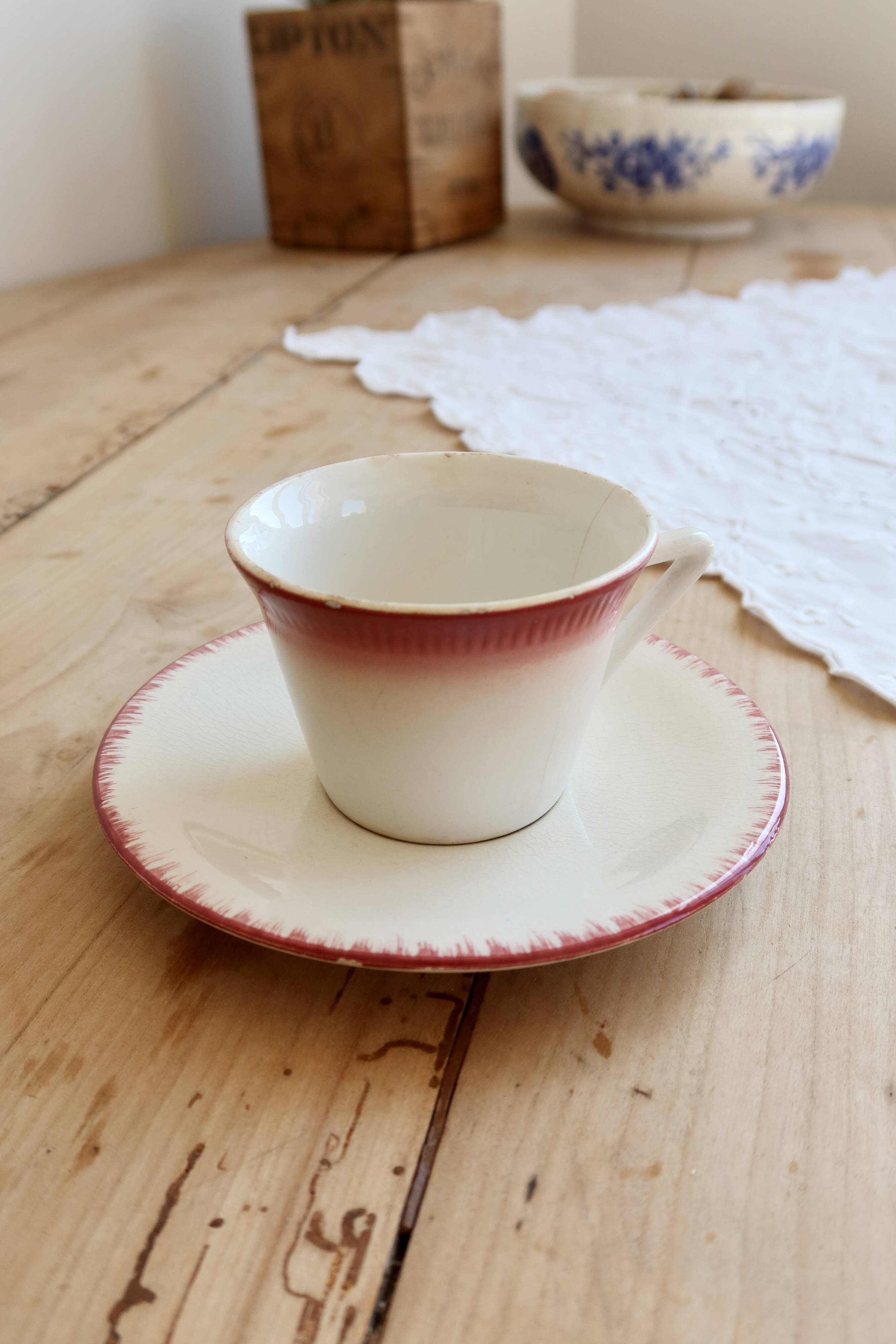 Antique Longchamp ironstone coffee cup with saucer.