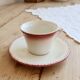 Antique Longchamp ironstone coffee cup with saucer.