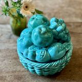 Vintage green earthenware plate/basket with fruit decorations.