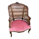 Louis XV style walnut and cane armchair