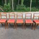 4 dining chairs made of solid wood and pink velvet fabric from the 1950s.