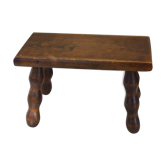 Old wooden stool, worked, turned foot, handcrafted