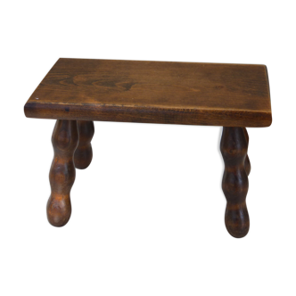 Old wooden stool, worked, turned foot, handcrafted