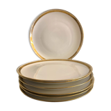 7 flat plates in porcelain of Limoges Bernardaud, decoration of golden Greek, XXth century