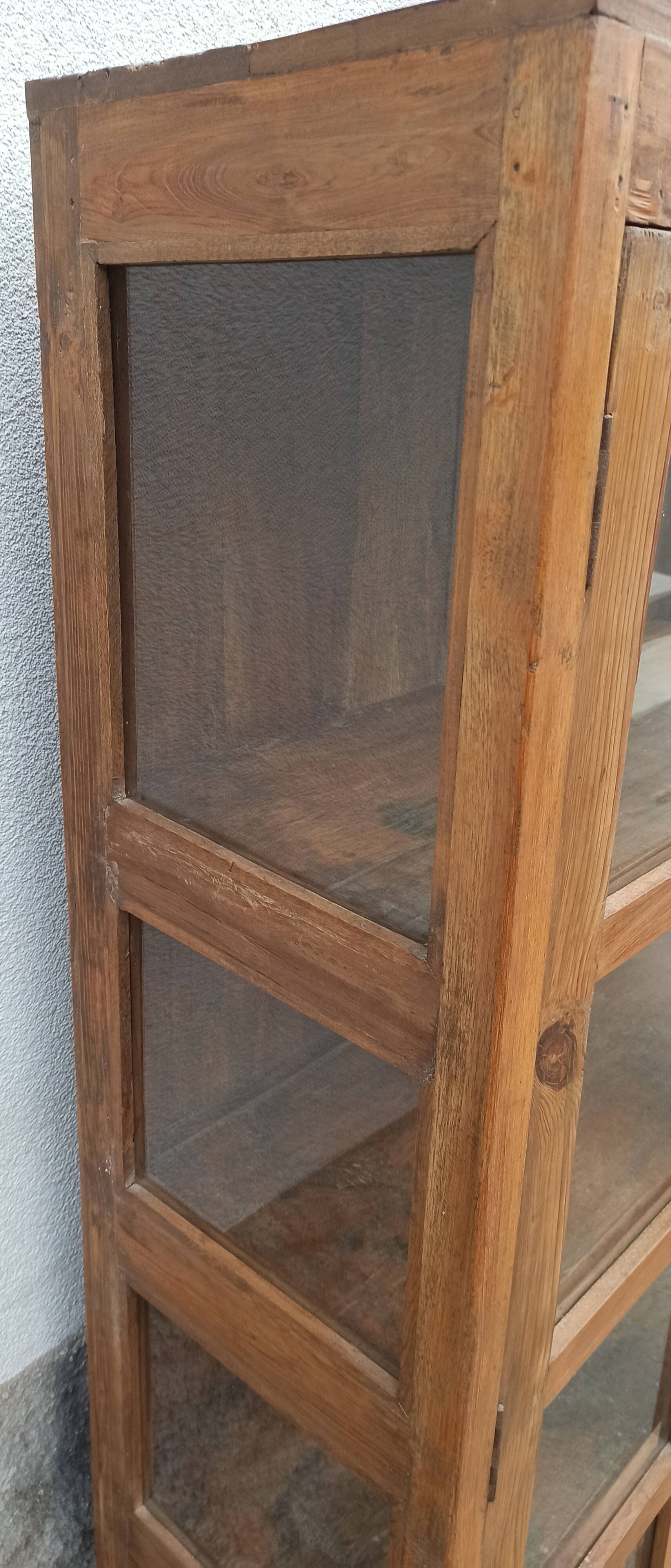 Old wooden cabinet display case with two doors