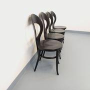 Set of 4 vintage Mouette chairs by Baumann in black wood from the 1960s.