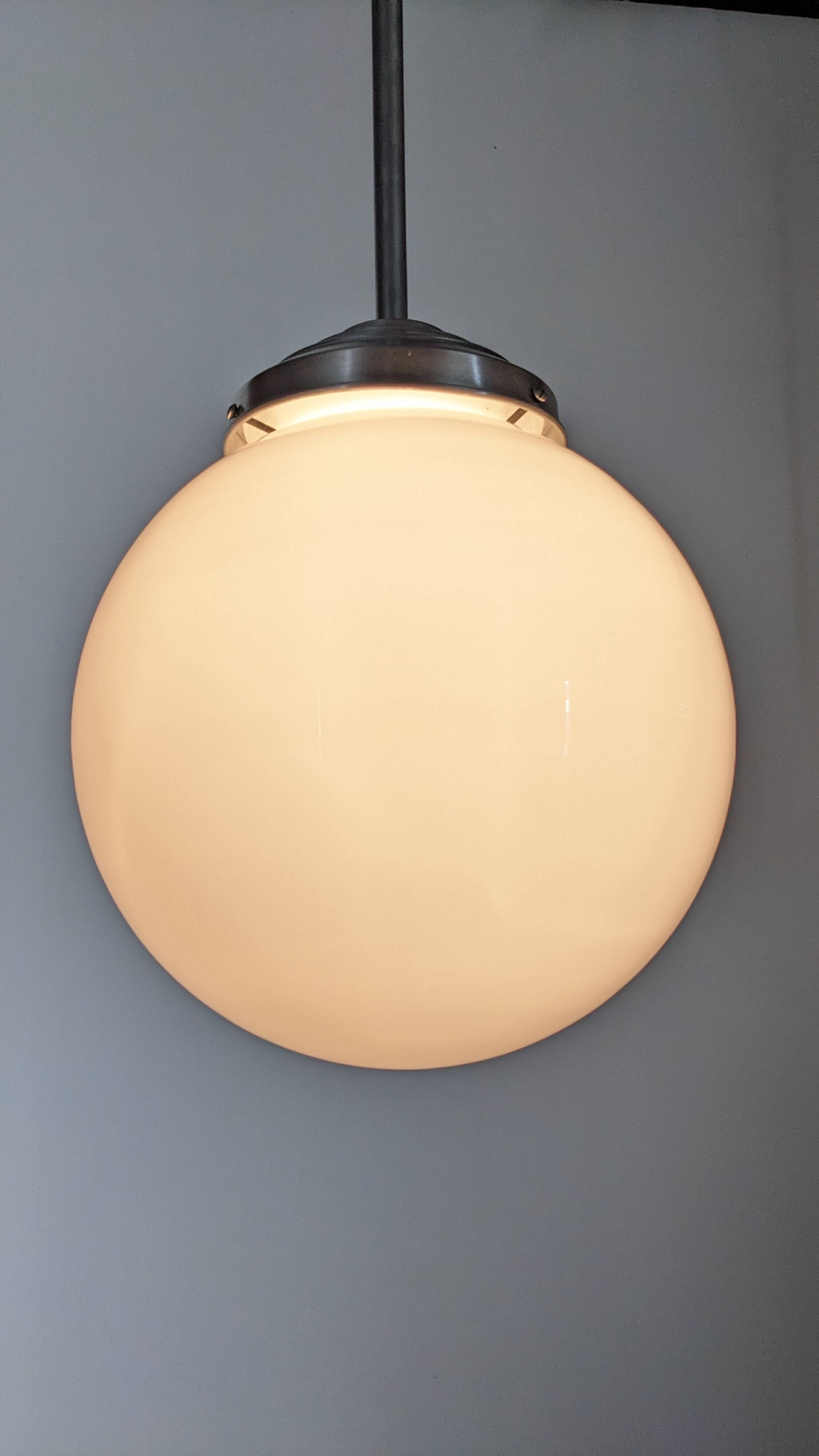 XL Art Deco white opaline suspension light, France circa 1920.