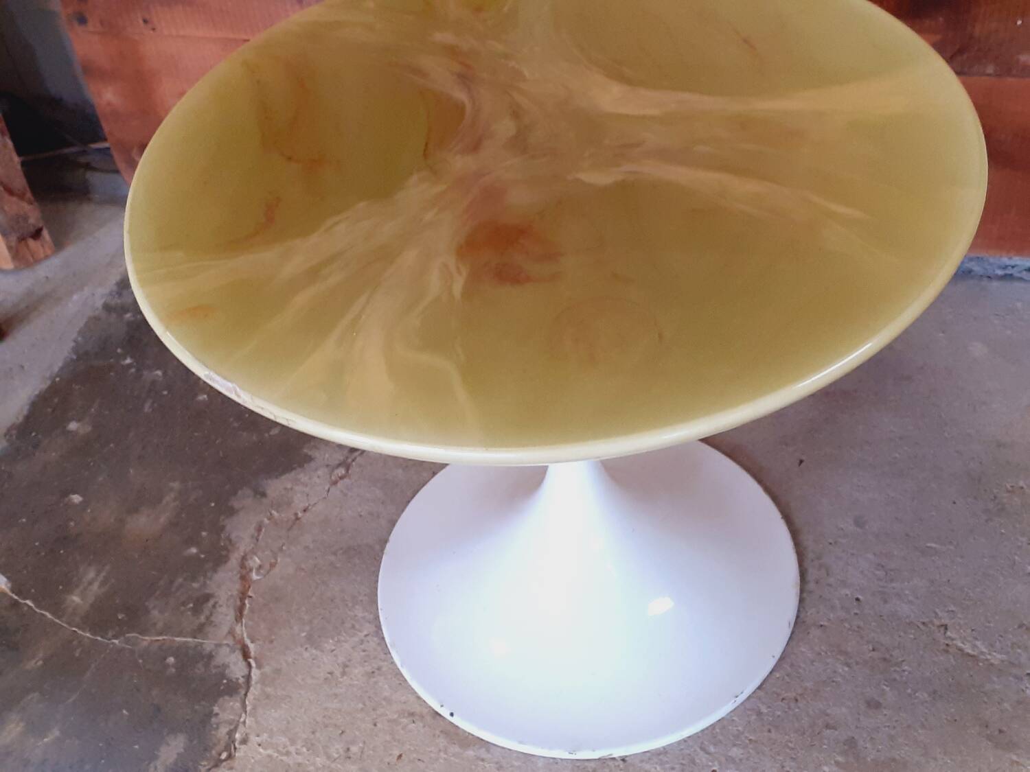 Tulip-shaped side table.