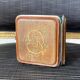 Old wooden, metal and silk cigarette case 19th century