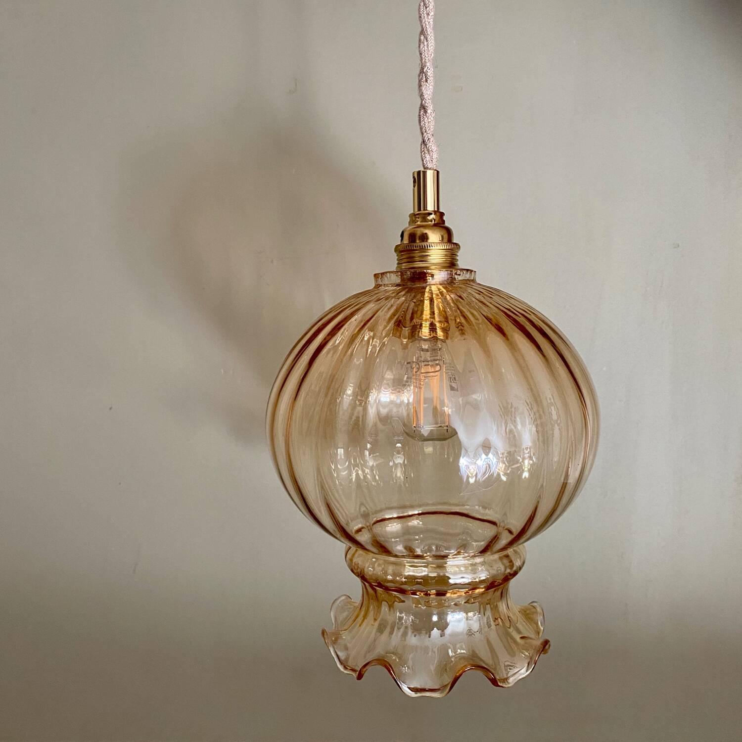Vintage amber glass globe pendant light